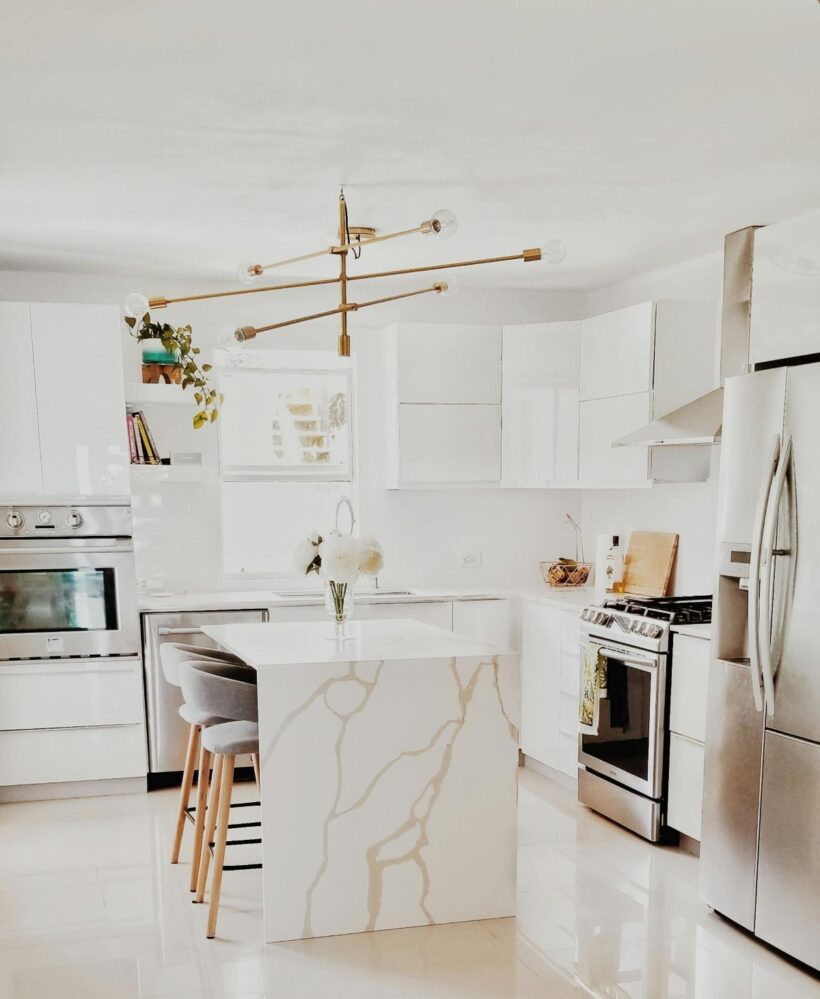 Modern kitchen design in white marble color photo